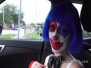 Sometimes Lexi Belle is dressed and painted like a clown, doing bj in the by-passing car!